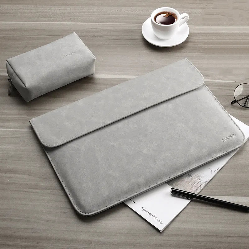 Frosted abrasive computer bag sleeve in grey for 13 inch MacBook Pro with textured surface