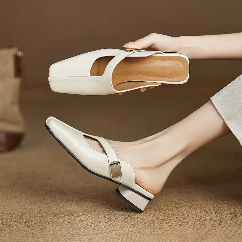 Women's square-toe outdoor slippers in black with a low heel and rubber sole.