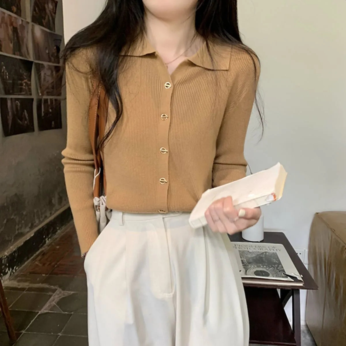Loose fit long sleeve viscose knitted cardigan in beige, shown worn open.