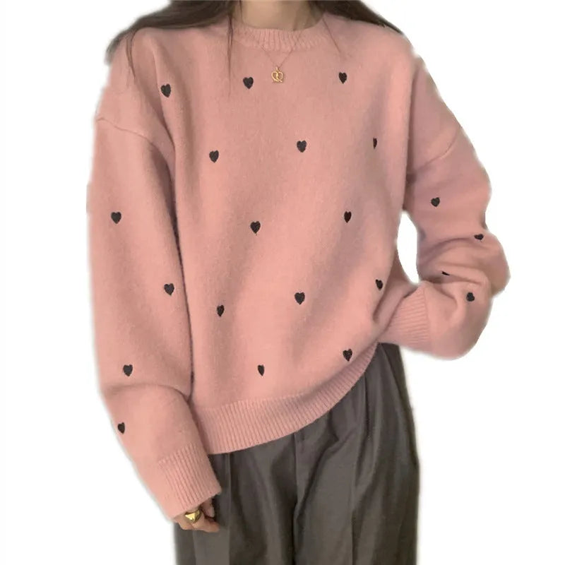 Women's loose acrylic pullover sweater with embroidery details in milky white colour