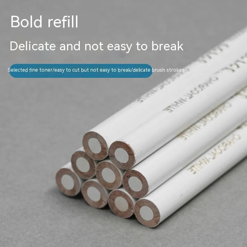 Three white charcoal pencils with wooden casings for sketching and highlighting on dark paper