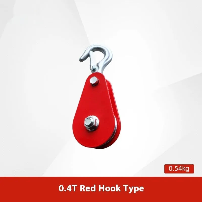 Red industrial lifting pulley with a forged steel safety latch hook and wire rope wheel.