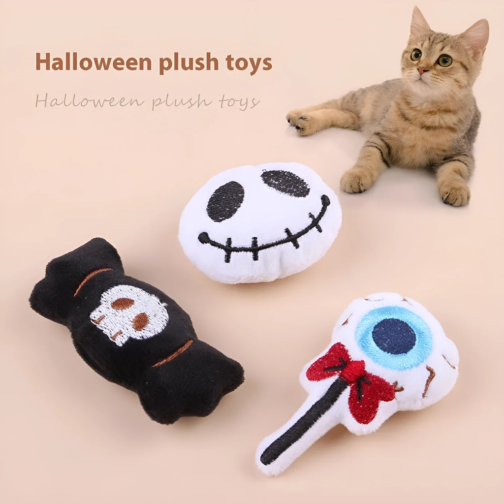 Small handheld cat teaser with plush candy and eyes attachments on wand