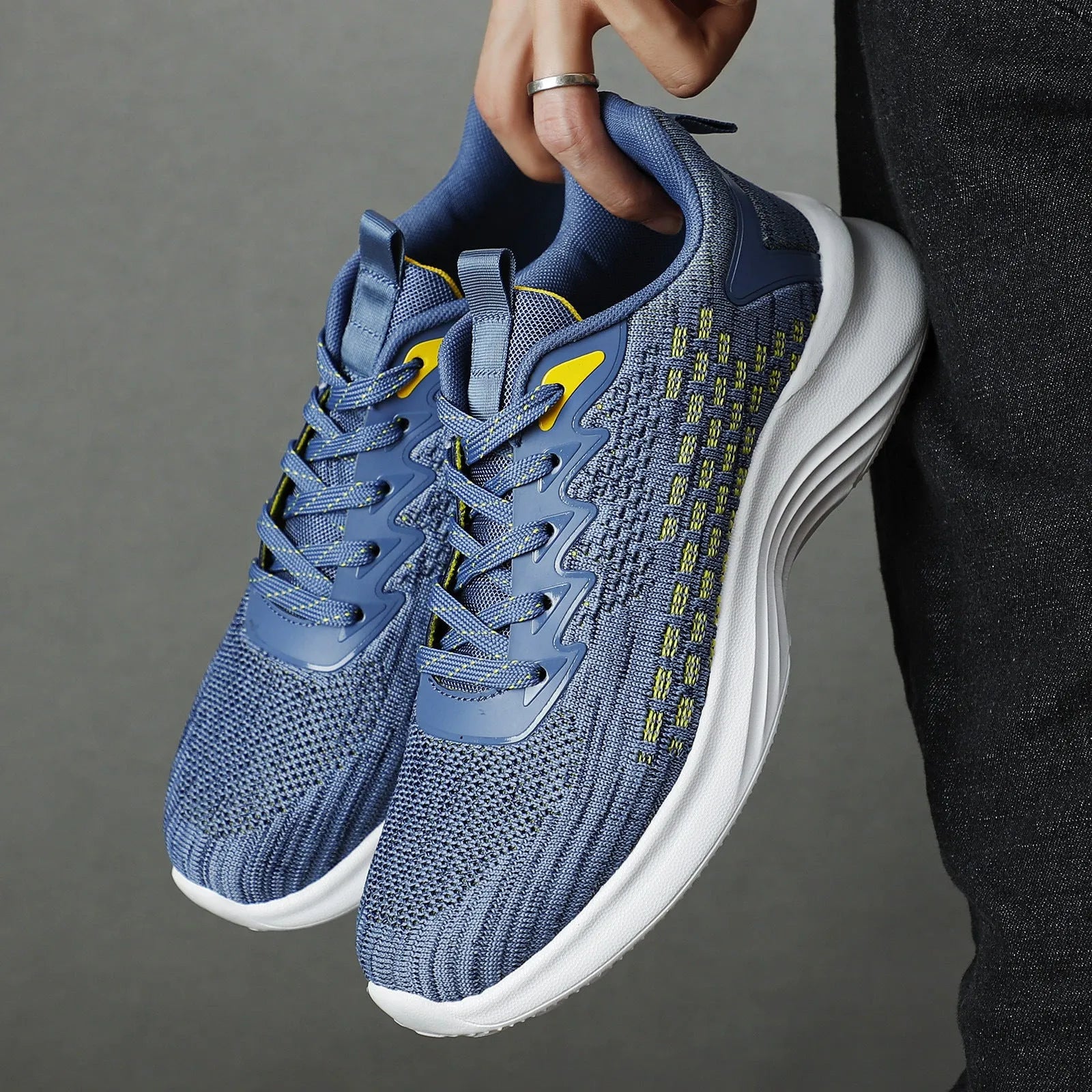 Women's lavender purple Flyknit running shoes with mesh lining and striped pattern.