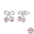 Sweet cherry stud earrings in 925 sterling silver with heart silhouette on light background