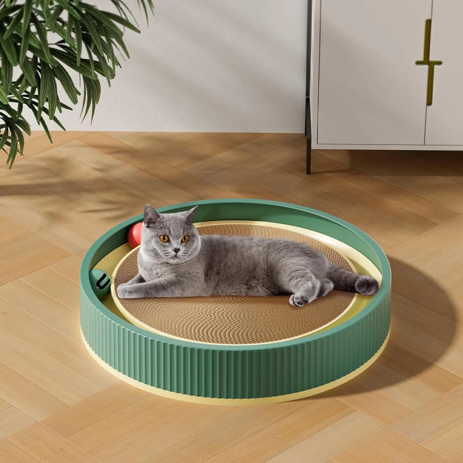Large circular cat scratching board with integrated ball toys and refillable cardboard core