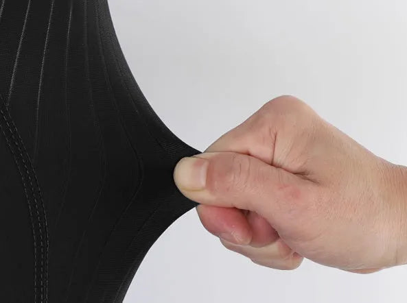 Black seven-inch cycling shorts with a shock-absorbing strap and double pockets, shown with an included cycling cushion.