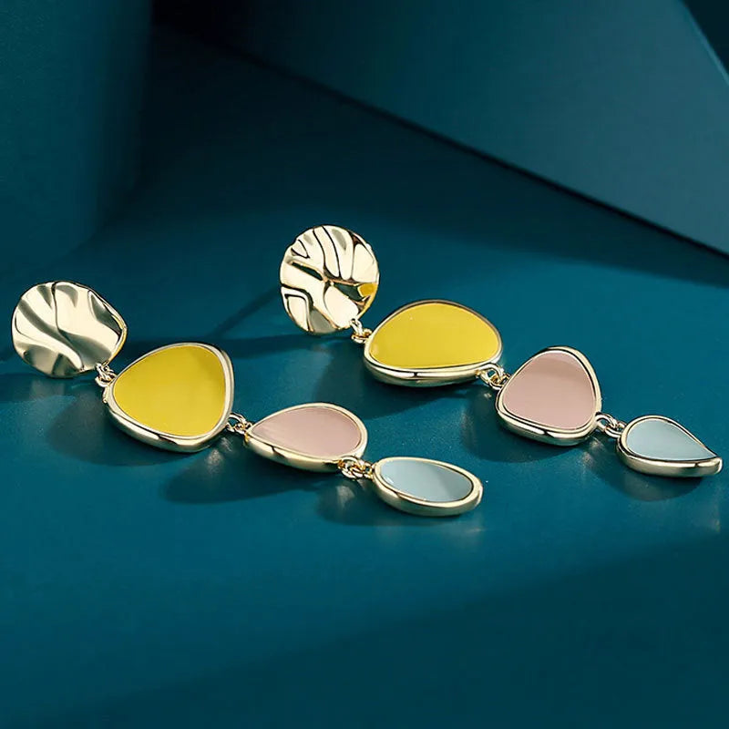 Morandi three-colour wafer disc earrings with needle post fitting on alloy base