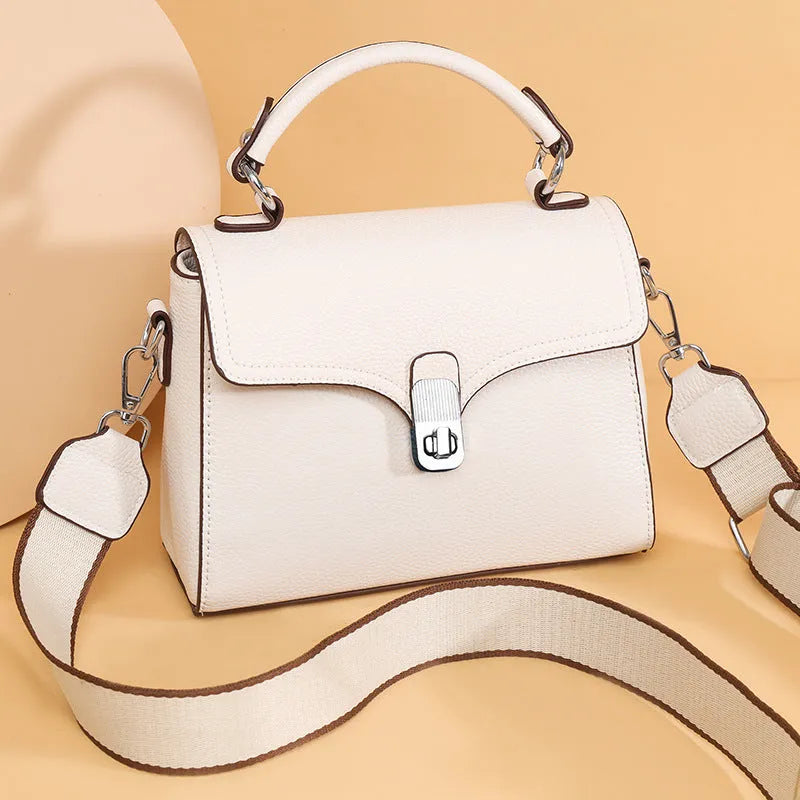 Korean commuter women's cross-body bag in genuine leather, oval shape, sandwich pocket, 21x18x9cm
