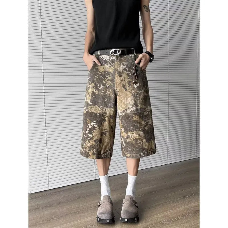 Yellow snake pattern camouflage cropped jeans in cotton denim.