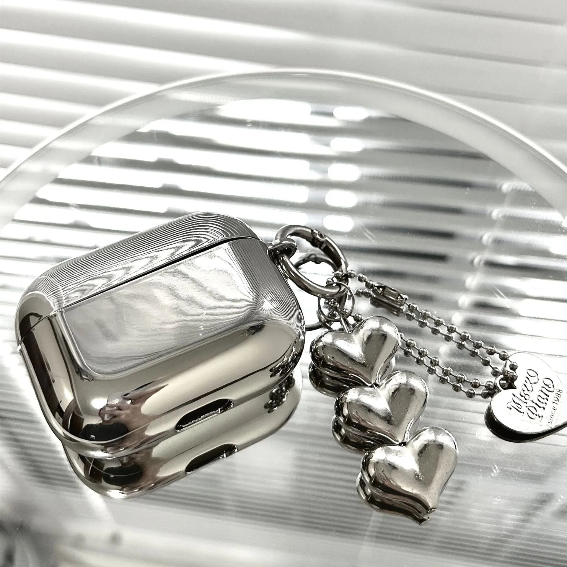 Electroplated solid colour TPU case for AirPods with attached heart pendant and bracelet chain