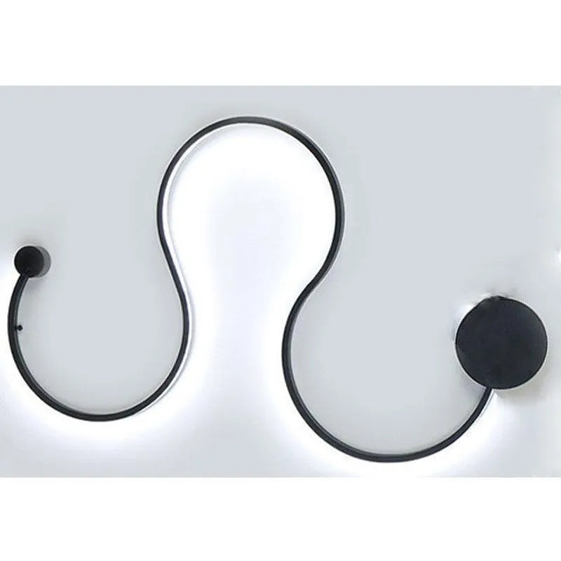 Modern LED wall lamp with aluminium shade in black finish, wall-mounted design for bedroom or corridor lighting