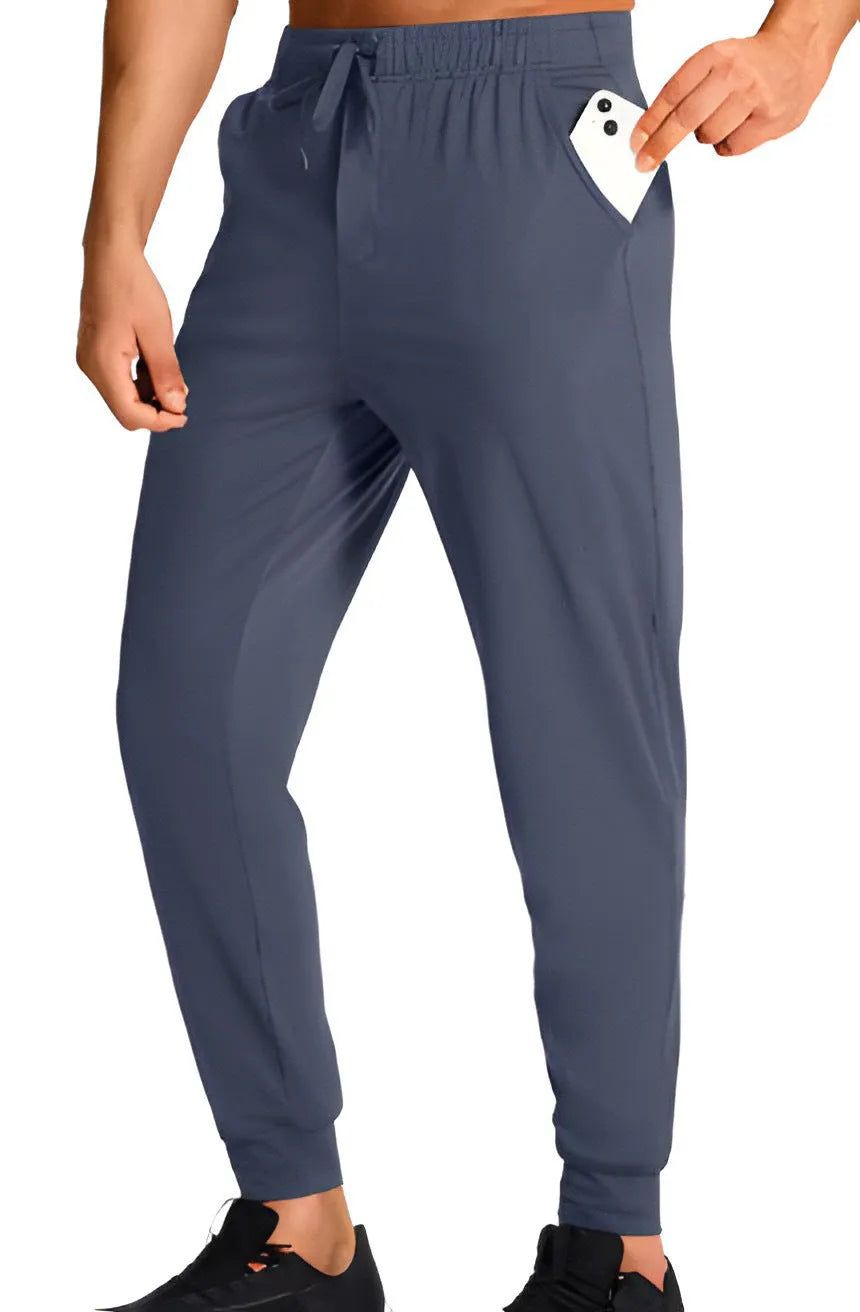 Men's loose casual trousers in polyester fabric available in multiple colours and sizes