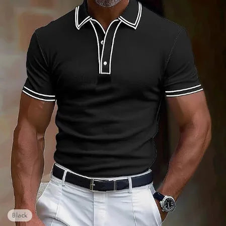 A man wearing a loose-fitting, striped short-sleeved T-shirt for casual summer leisure.