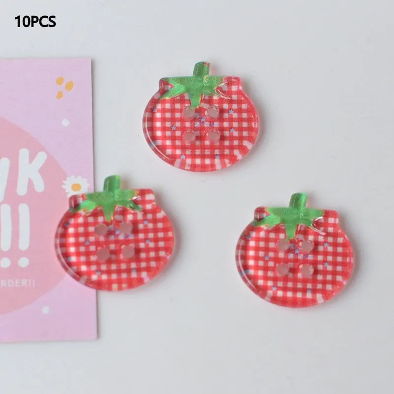 Plastic tomato button ornaments in cherry tomato printing, red plaid, solid red, and mixed colour designs