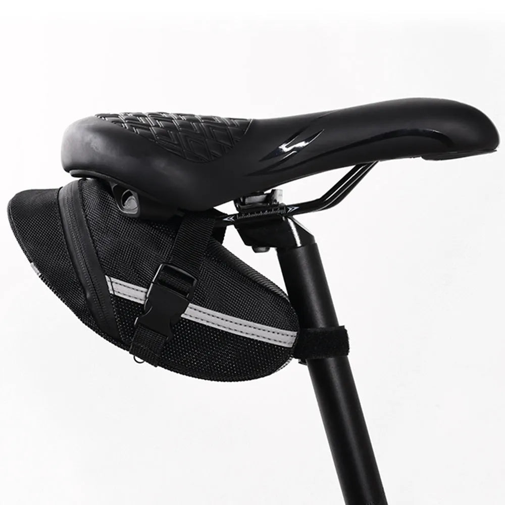 Black polyester bicycle saddle bag with quick release mount under a bike seat