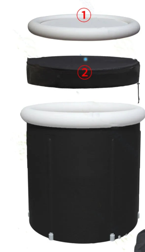 Black inflatable portable ice bath tub with weather lid, shown outdoors.