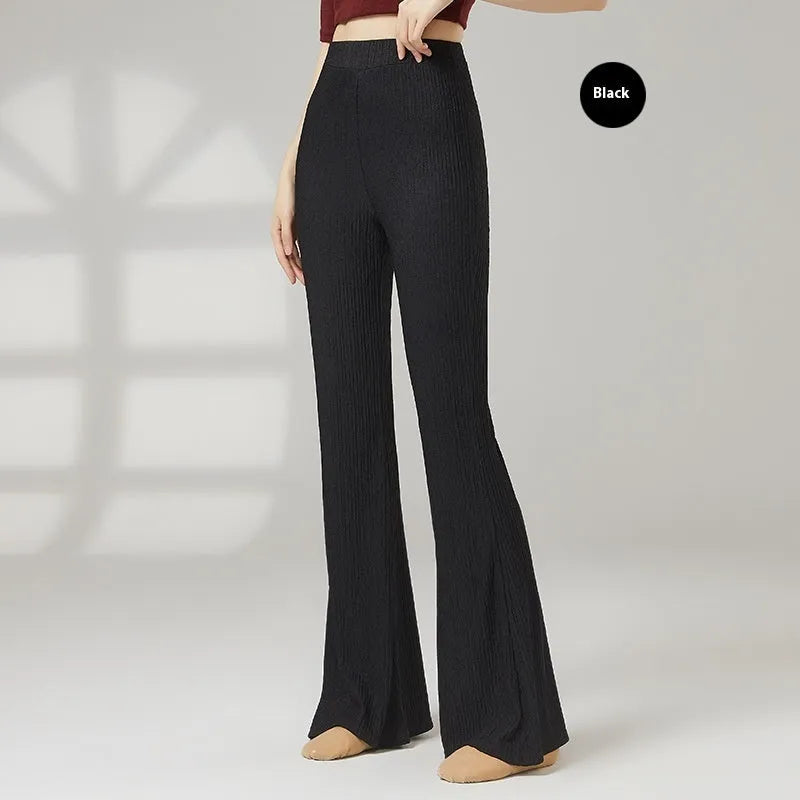 Women's solid colour polyester dance practice pants for classical ballet and body training.