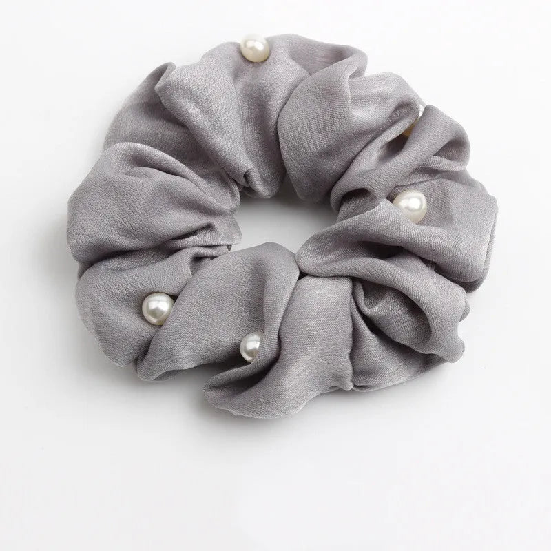 Set of 6 cloth-covered rubber hair rings in black, dark blue, grey, light blue, pink, and red