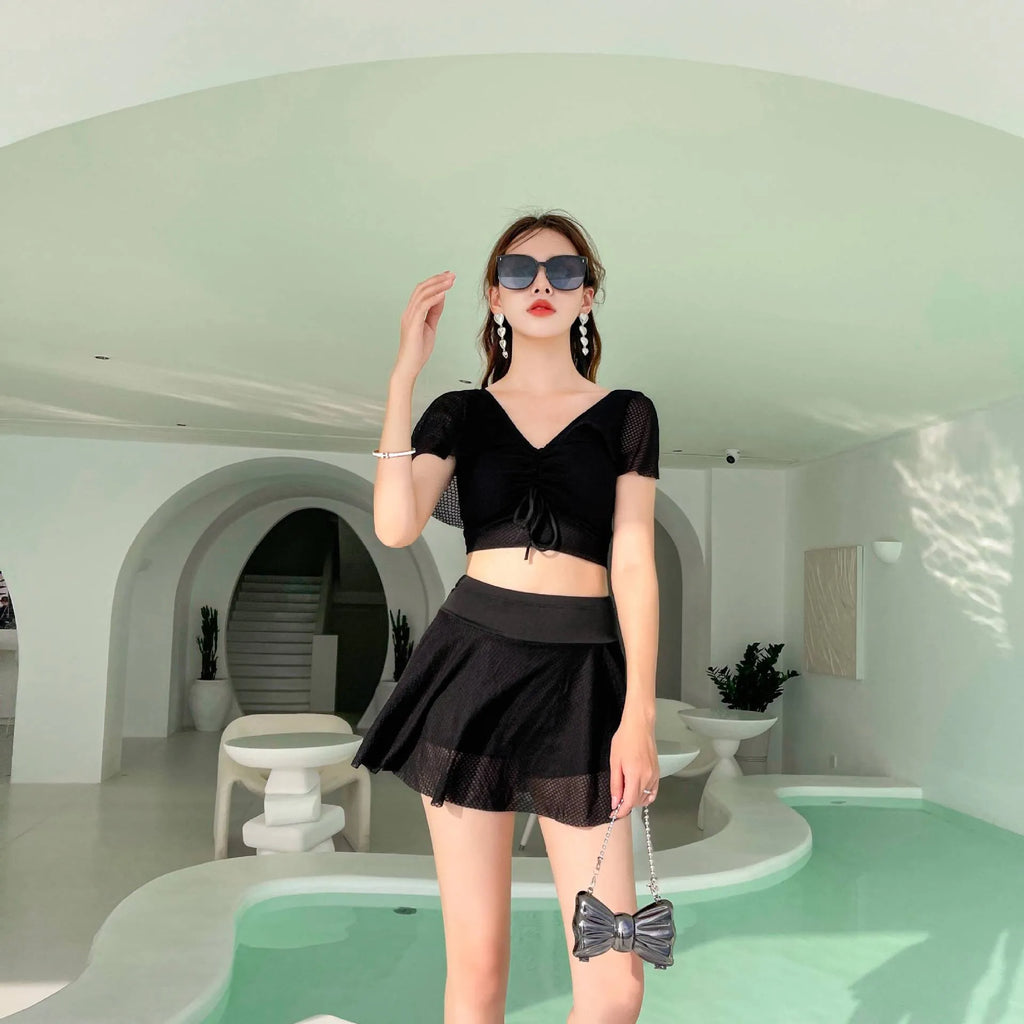 Women's solid colour two-piece skirt swimsuit in polyester and spandex fabric