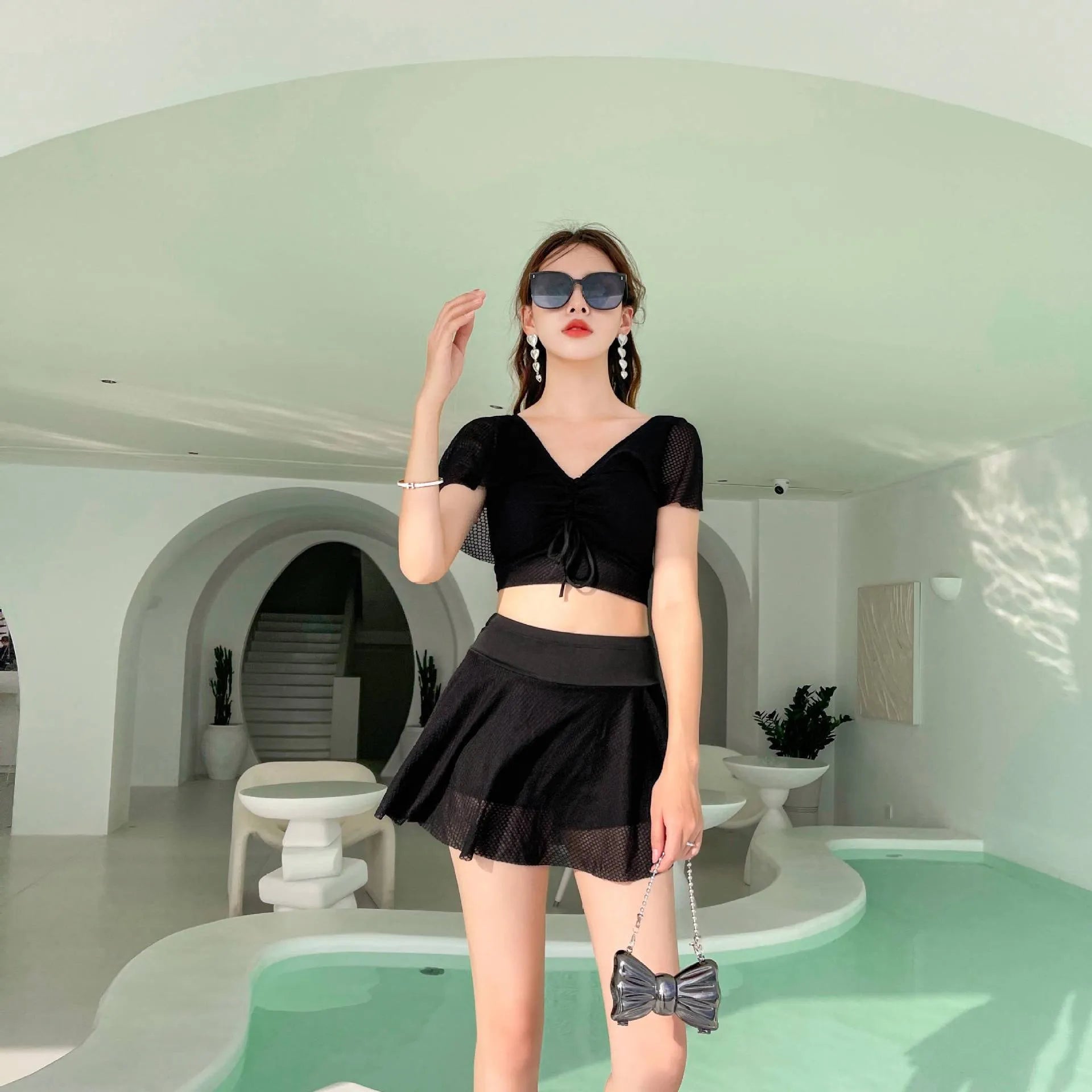 Women's solid colour two-piece skirt swimsuit in polyester and spandex fabric