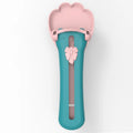 Green and pink pet feed spoon for snack extrusion and cereal dispensing with squeezer feeder design