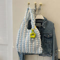 Women's pleated bubble shoulder bag in square vertical shape with three-dimensional pockets