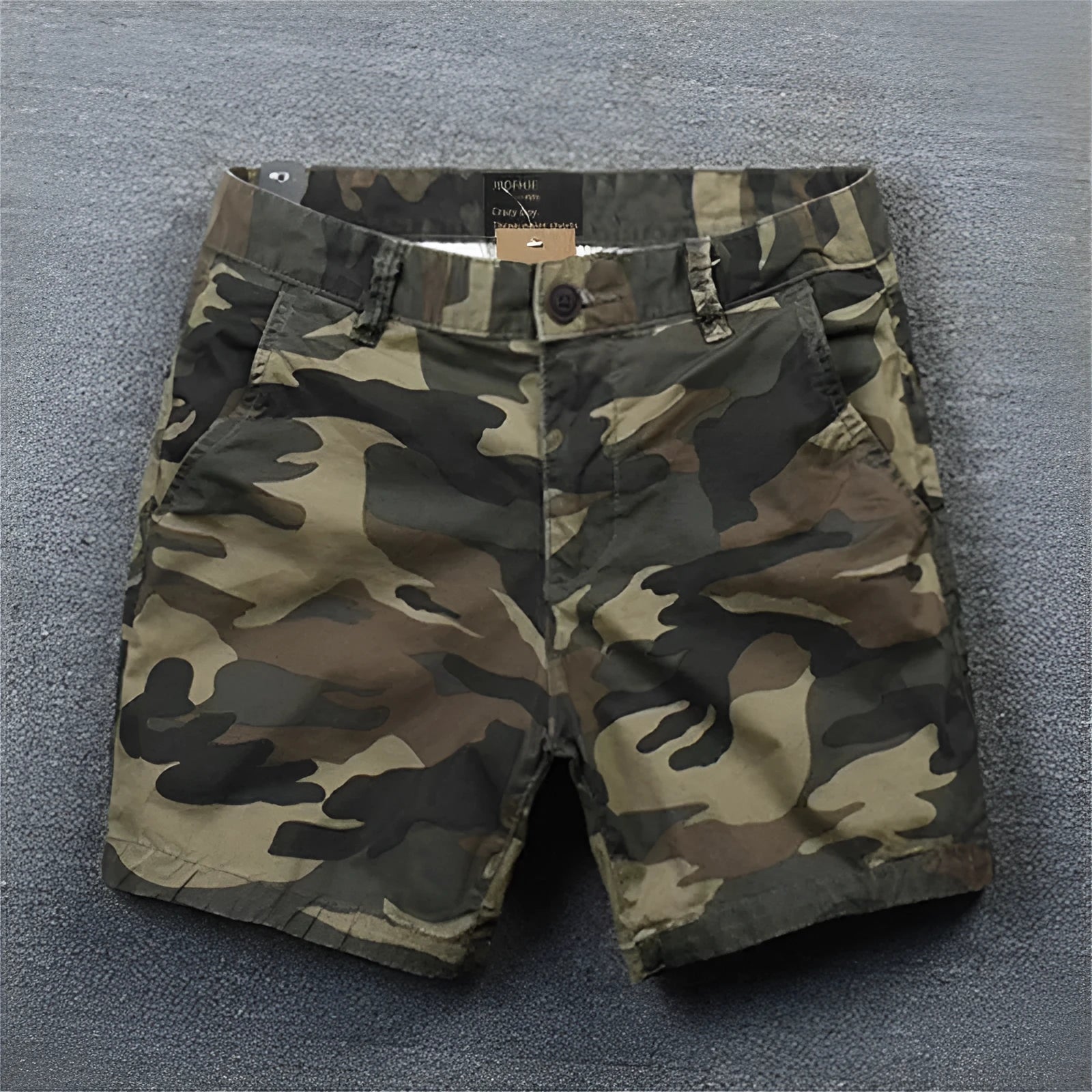 Men's cotton loose shorts in straight-leg cut with zipper fly, shown in multiple colour options including camouflage patterns
