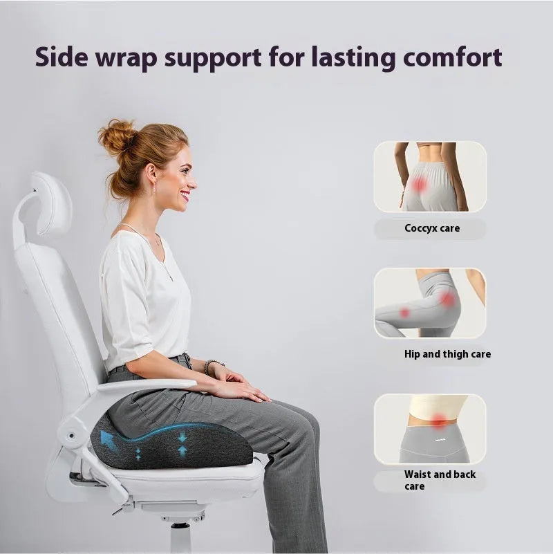 Light grey memory foam office chair cushion with non-slip backing on a desk chair.