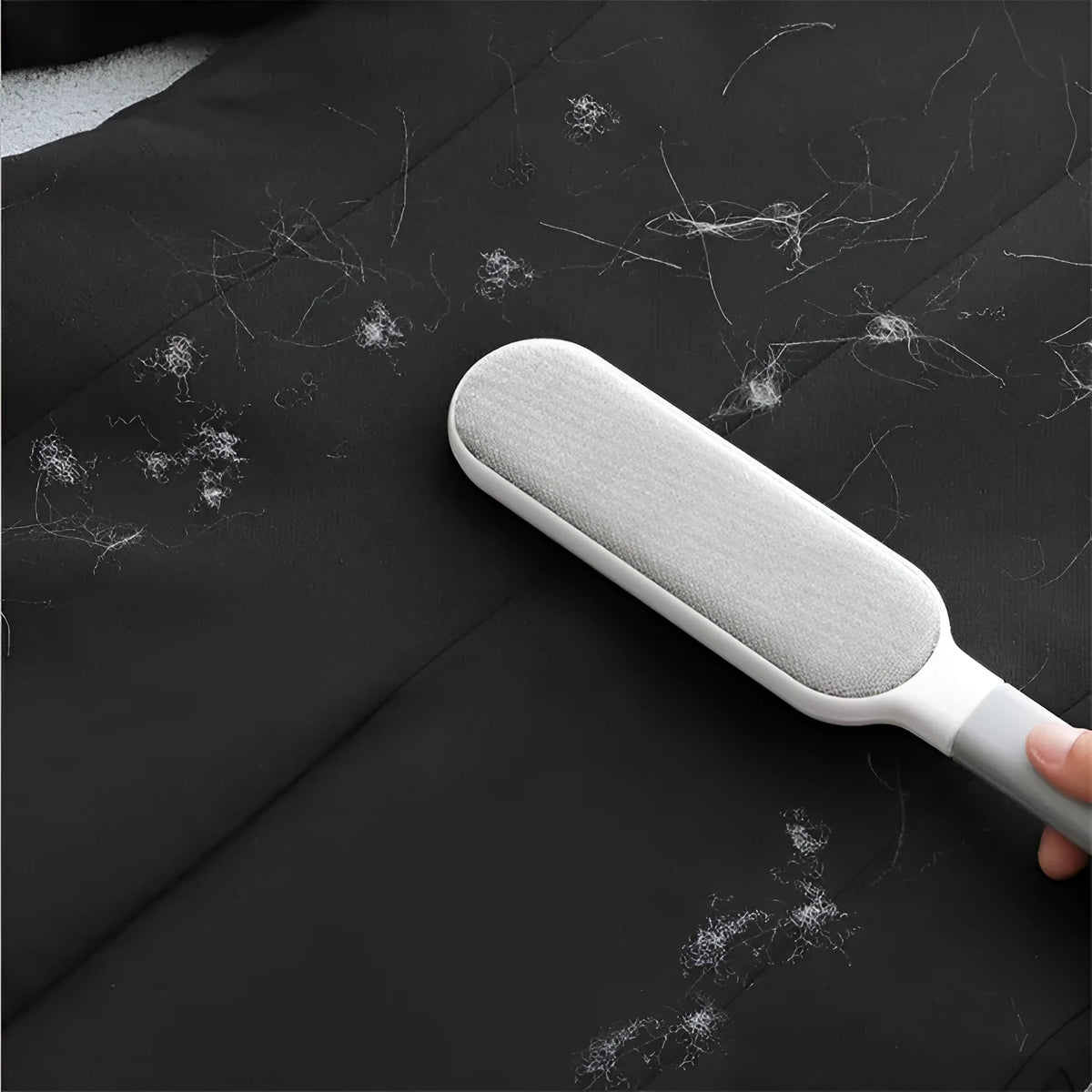 Electrostatic hair removal brush in L and S sizes for pet hair and lint removal on fabric surfaces