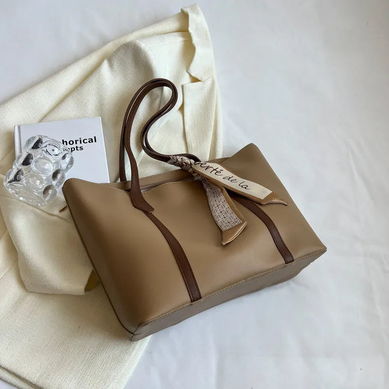 Large capacity bucket-style tote bag in multiple colour options with sandwich pocket exterior