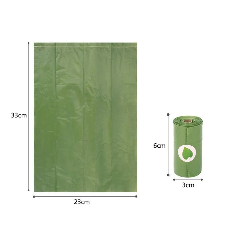 Green roll of EPI degradable thickened pet poop bags next to a green dispenser unit on a white background.