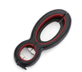 Six-in-one can opener in grey, ergonomic handle with stainless steel parts, on a kitchen counter