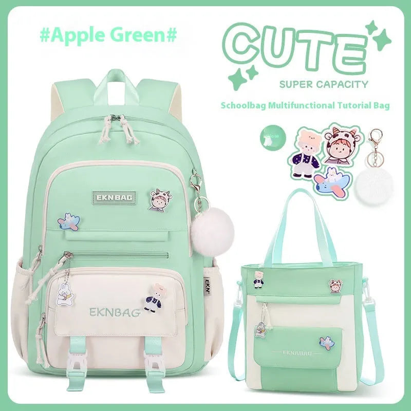 Girls' pink waterproof Oxford cloth school backpack with curved shoulder straps.