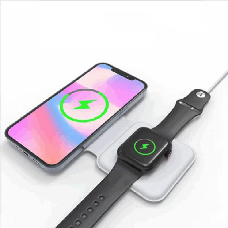 White foldable dual-pad magnetic wireless charging dock shown at an angle on a table.
