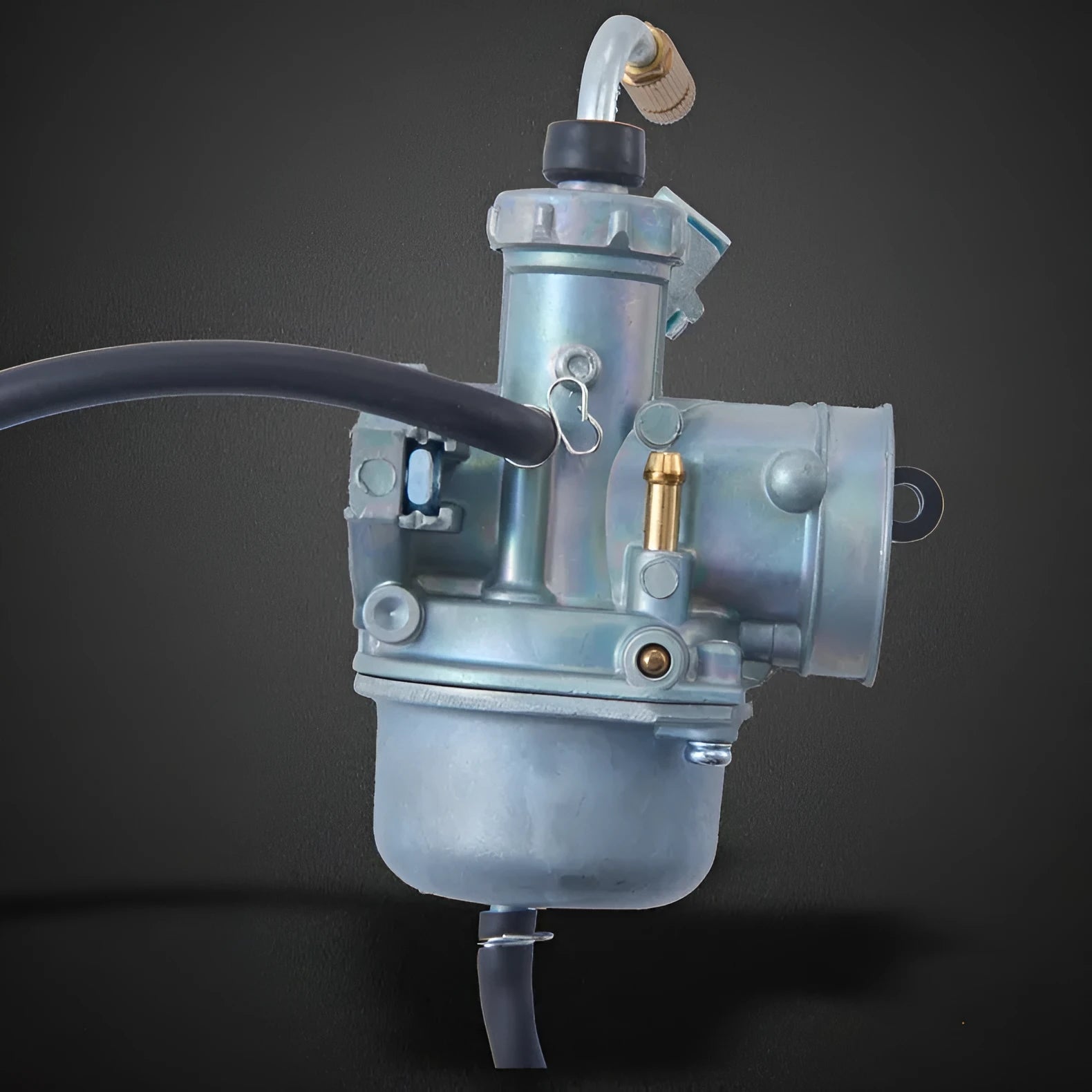 Motorcycle carburetor assembly showing flat suction plunger design for engine parts replacement