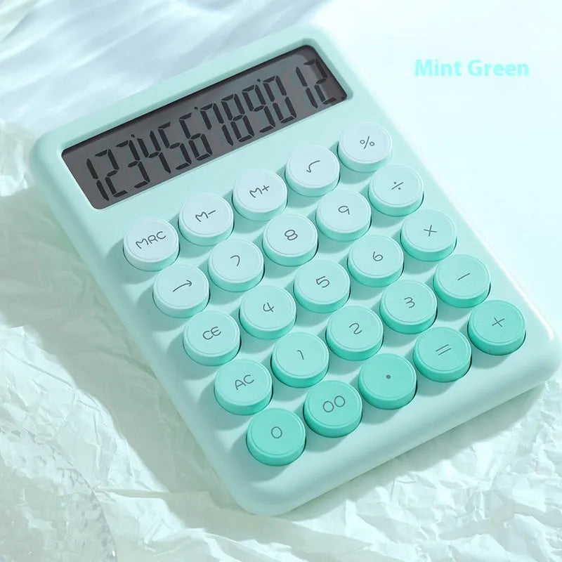 Desk calculator in a choice of violet, cherry blossom powder, glacier blue, and mint green gradient colours.
