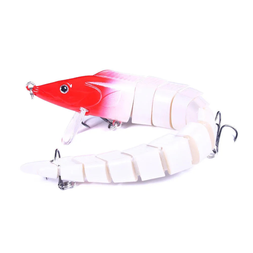 Multi-segment soft fishing lure mimicking a loach, shown in a realistic colour pattern with a visible hook.