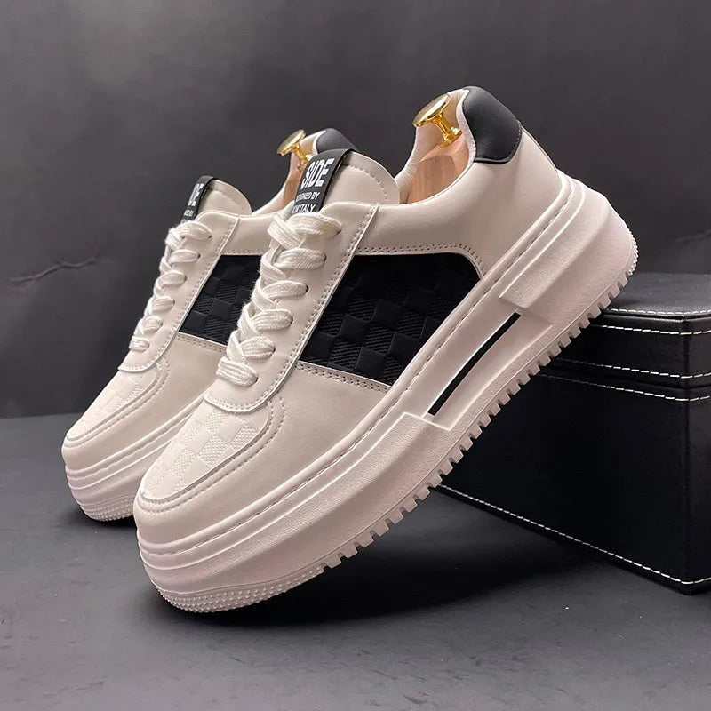 White, green and black sports casual shoes with cloth upper and rubber foam sole showing heel lift insert option