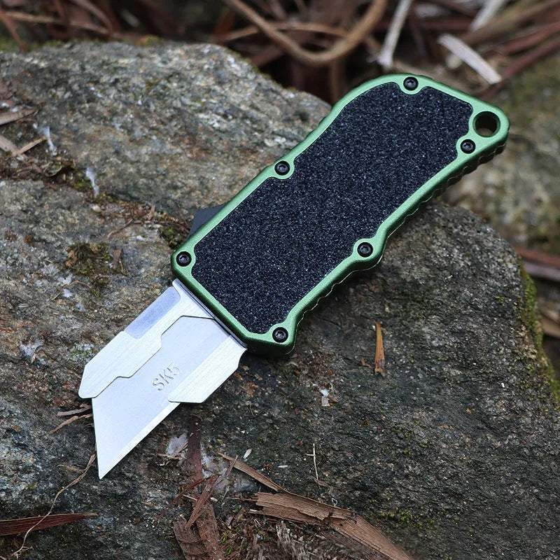 Alloy Outdoor A folding knife with SK5 alloy blade, 135mm full length, shown in a colour variant with removable blade