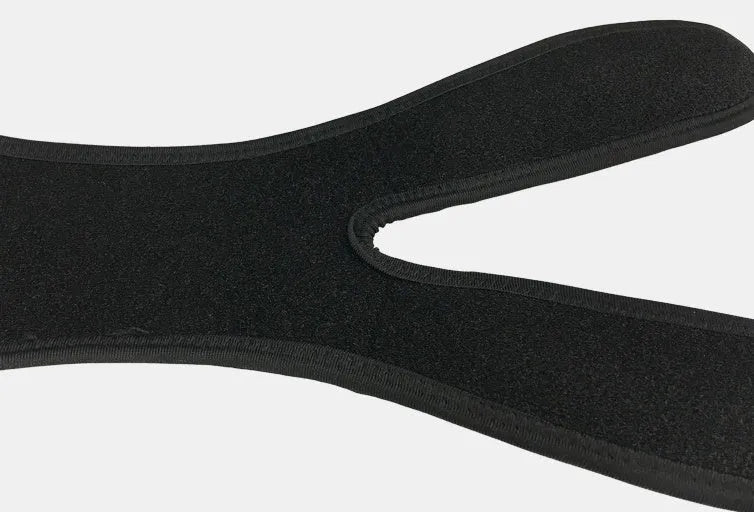 Professional patella band knee support in black with shock absorbing EVA pad and breathable rear perforations