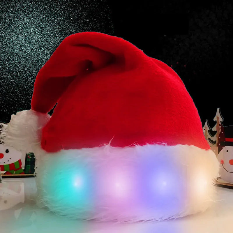 Red and white LED light up Santa hat with pom-pom, showing multicoloured twinkling lights on soft spandex material.