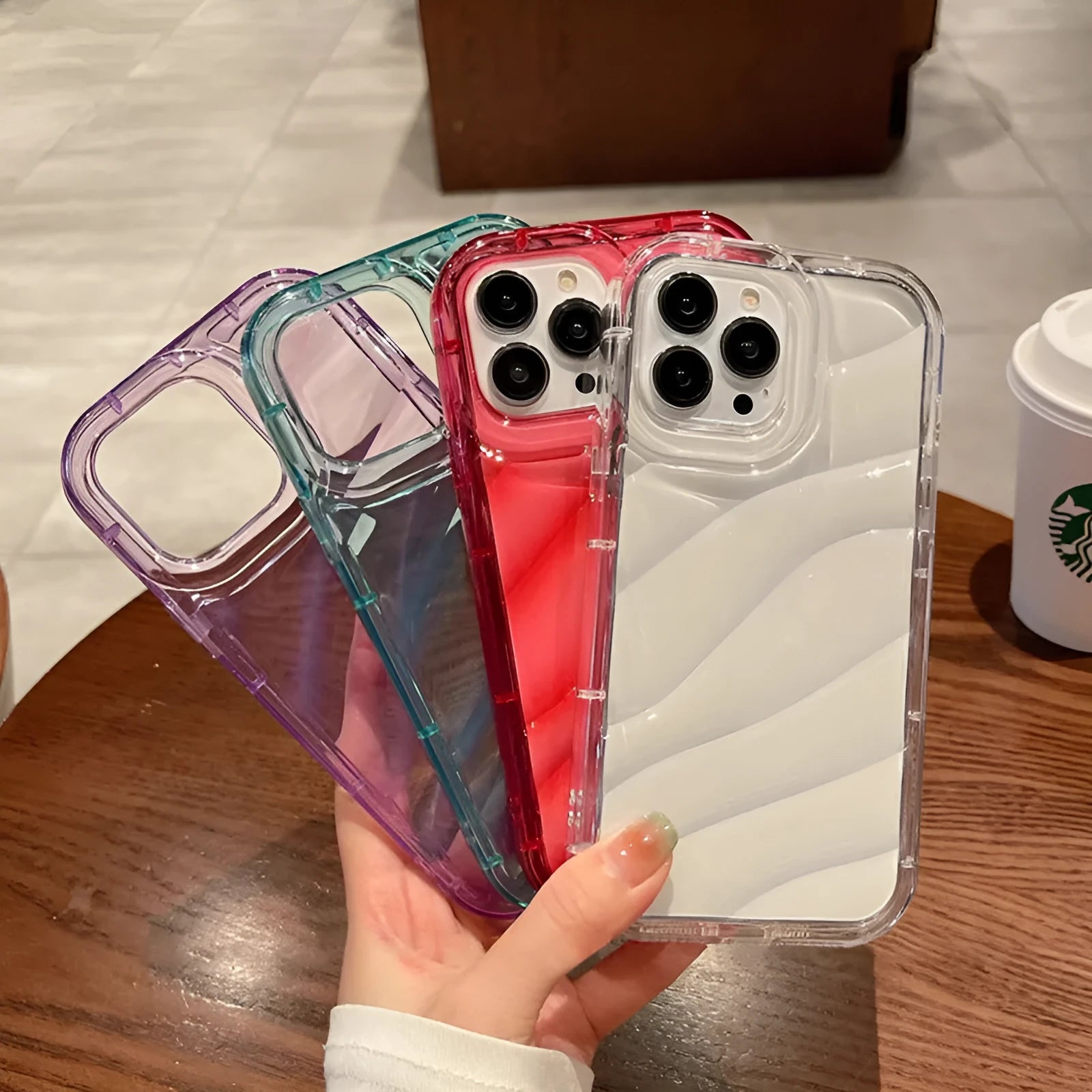 Transparent silicone phone case with embossed texture for iPhone, shown in clear finish