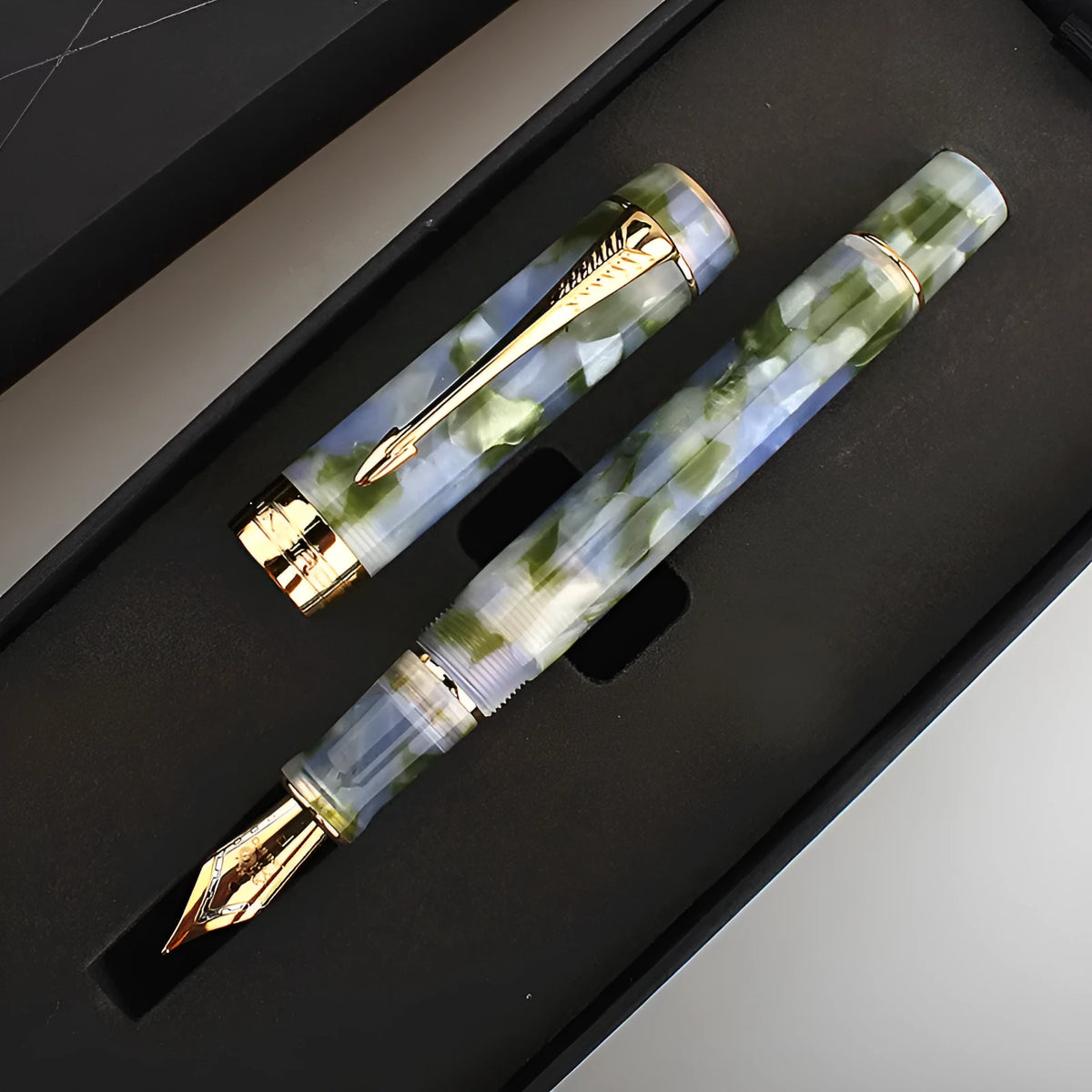 Deep Bath Green metal ballpoint pen with cap, showing 0.5mm F tip, 0.7mm M tip, and 1.0mm graphic tip options on a plain background