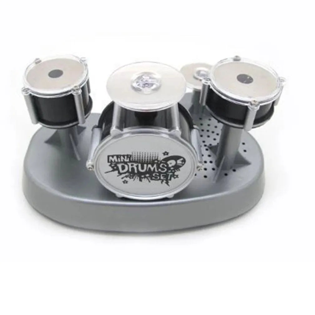 Silver creative finger touch mini drum musical toy with plastic body and finger tapping surface