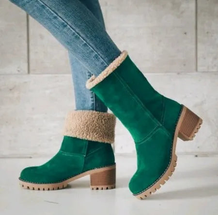 Women's mid-calf suede snow boots in black with a thick low heel and waterproof platform.