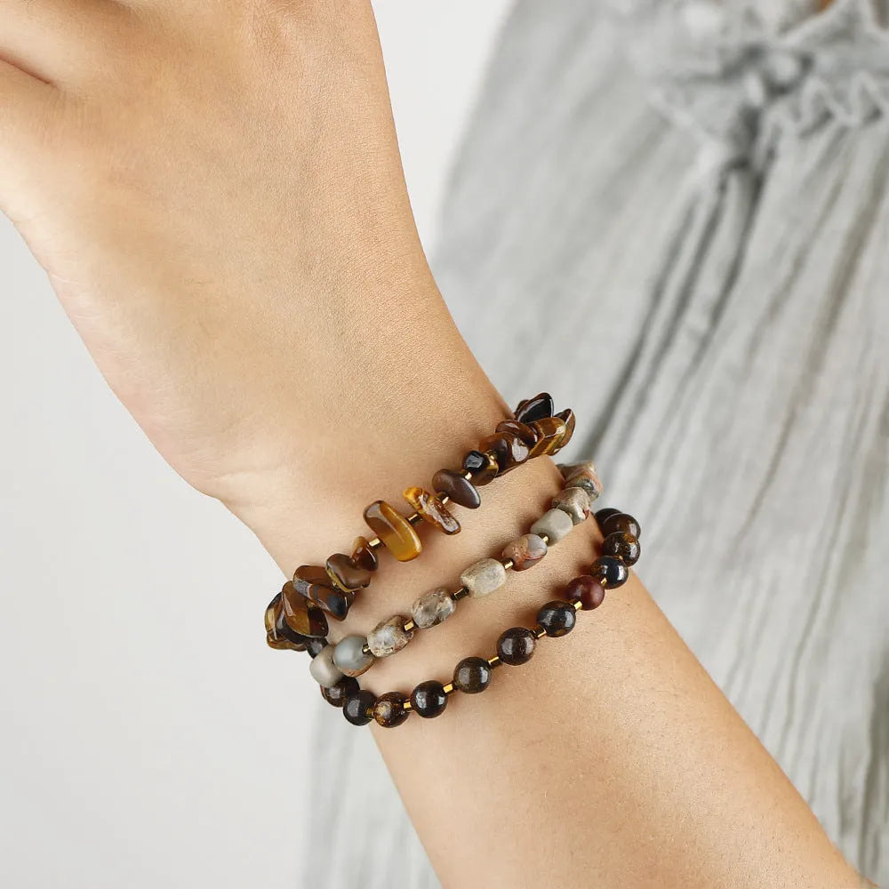 Brown Tigereye stone bracelet with bronze Glow Ball geometric charm