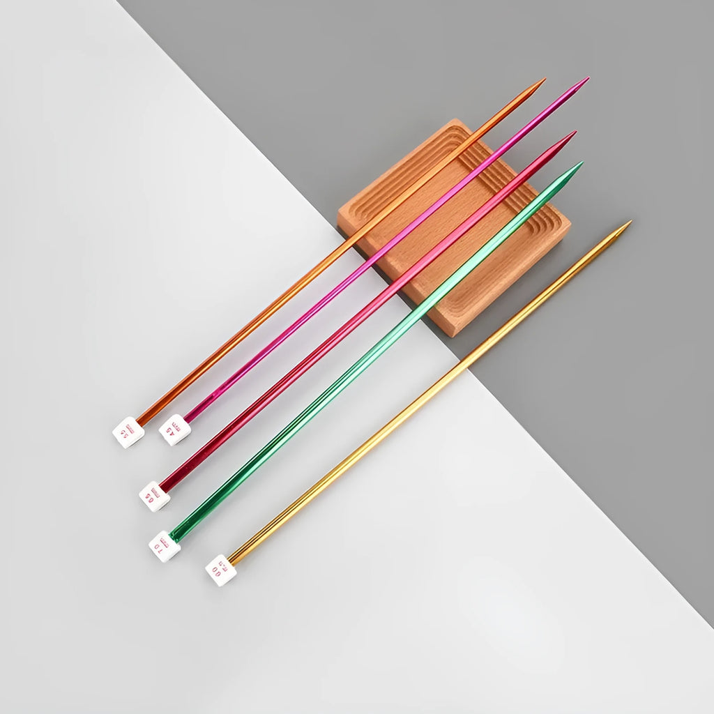 Aluminium crochet hook set showing 14 different sizes with protective plastic caps