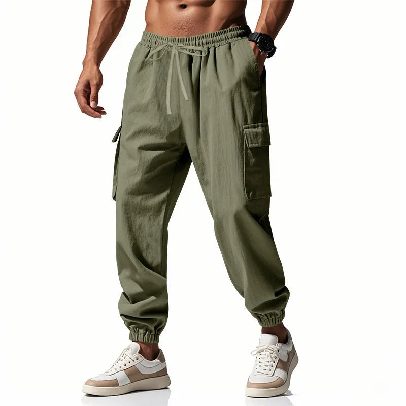 Men's casual linen trousers in solid colour with ankle ties and multiple pockets, loose fit, drawstring waist.