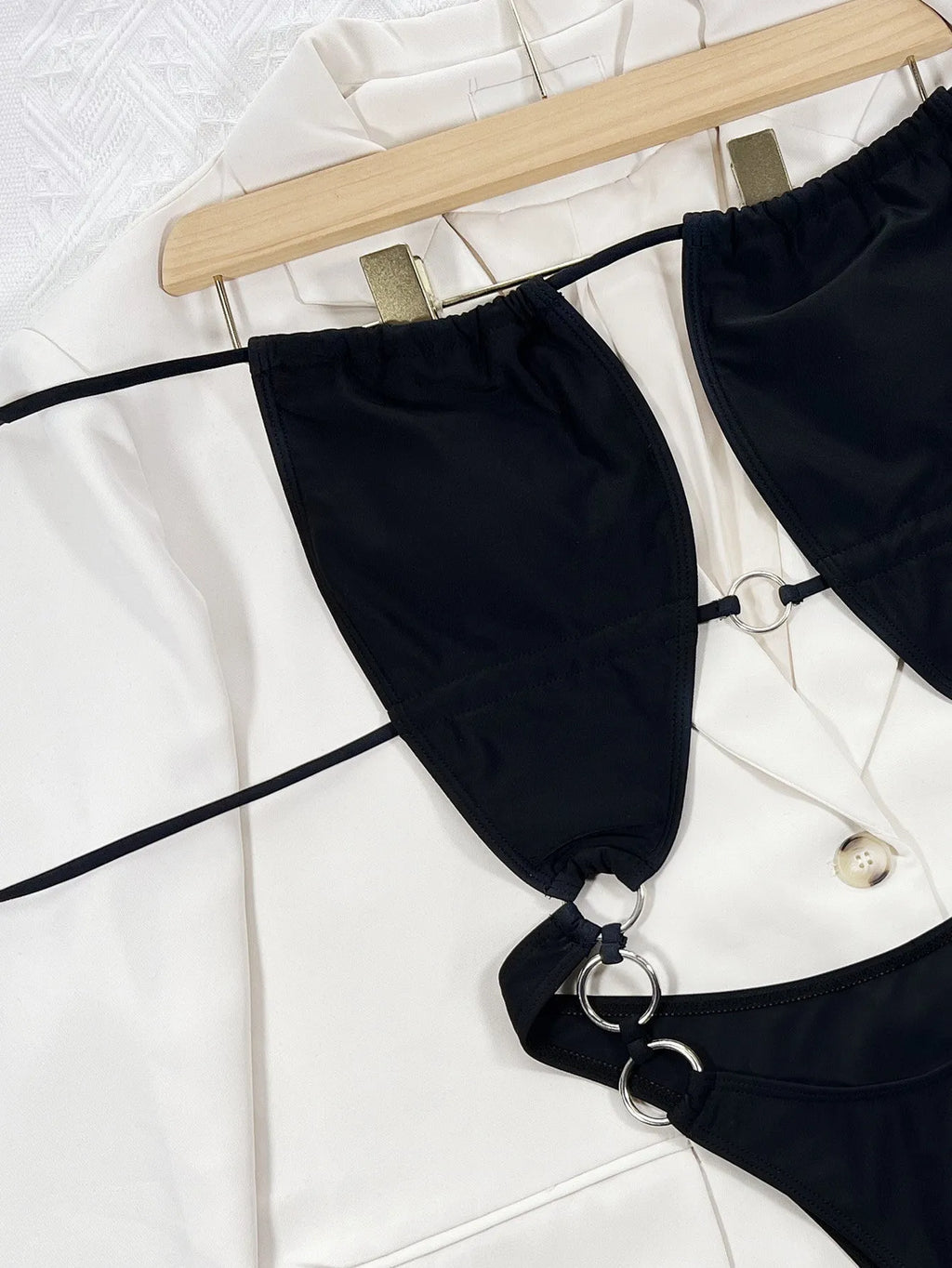 Black sleeveless one-piece swimsuit for women made from nylon fabric